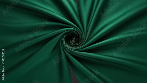 Hypnotic Green Fabric Swirl - Abstract Motion Background.