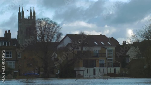 riverside buildings, church, houses, flooded river, winter flood, evening, St Neots, Huntingdonshire, Cambridgeshire, England