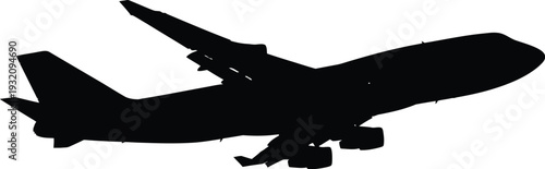 Silhouette of a commercial airplane in flight