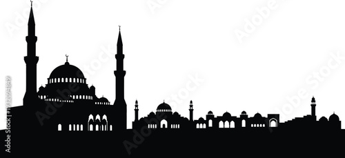 Mosque silhouette at sunset with minarets and domes