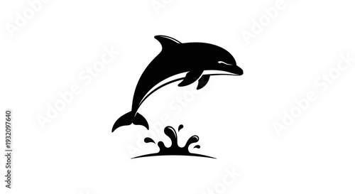 A sleek black silhouette of a dolphin leaping above splashing waves