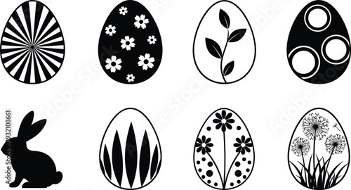 Eight black and white eggs with various patterns and a rabbit stripes