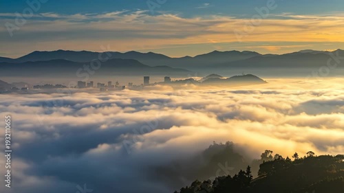 Majestic Mountain Landscape with Cloud Cover at Sunrise.
