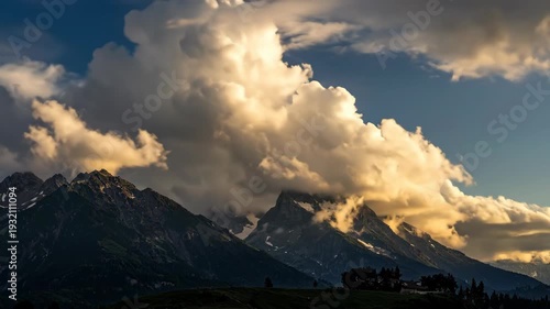 Majestic Mountain Landscape with Dramatic Cloudy Sky and SnowCapped Peaks.