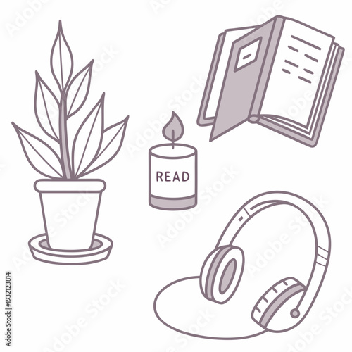 A serene workspace featuring a plant, a candle, an open book, and headphones.