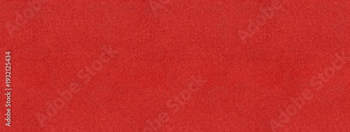 Red cloth fabric texture background. Seamless surface of burgundy red carpet floor.