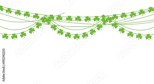 Delicate green shamrocks swaying gently on curved lines in festive decoration