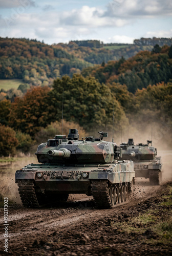 German leopard tank drives at a beautiful landscape