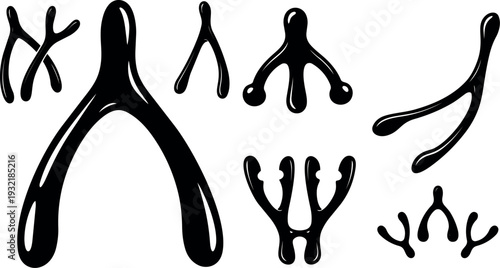Hand drawn ink line art assortment of stylized wishbone shapes isolated on white background with high contrast clean vector minimal