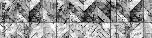 Black and white seamless pattern of geometric tiles featuring a textured, abstract chevron or parquet design.
