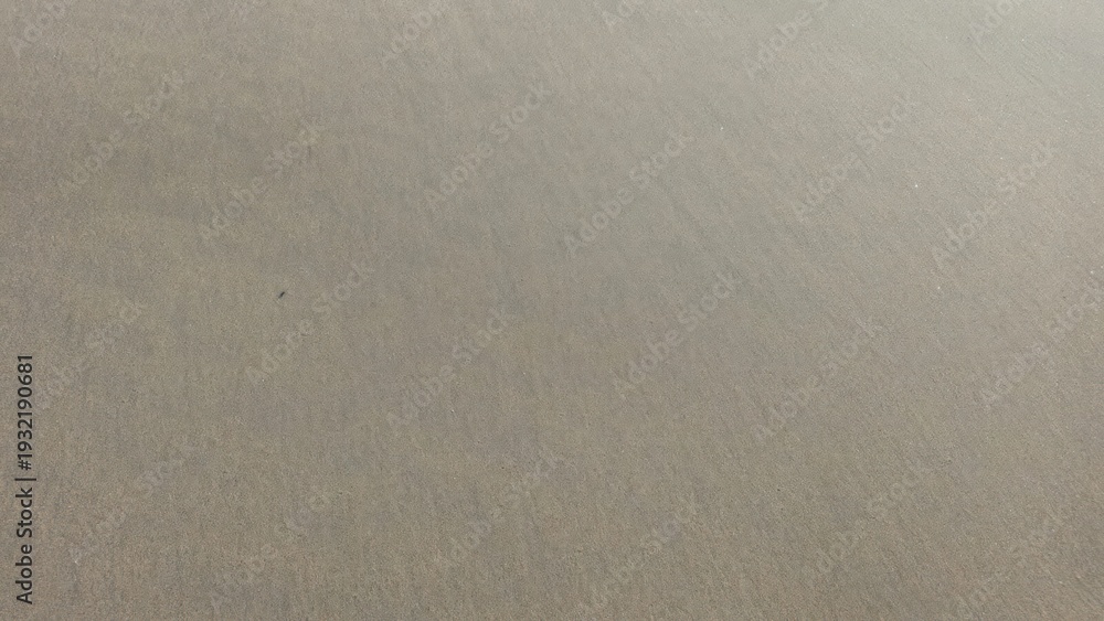 Fototapeta premium A close-up view of a textured gray surface with subtle gradient