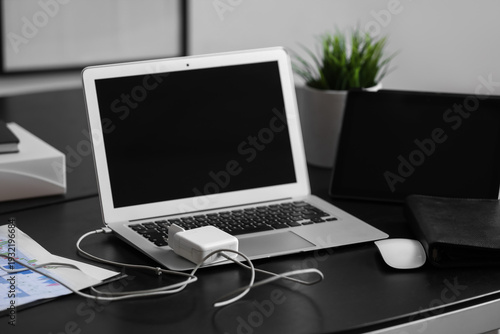 Modern laptop with tablet a...