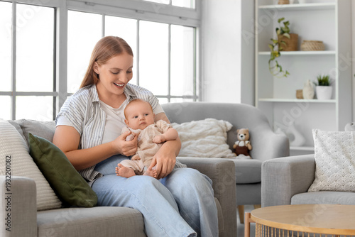 Beautiful young mother and ...
