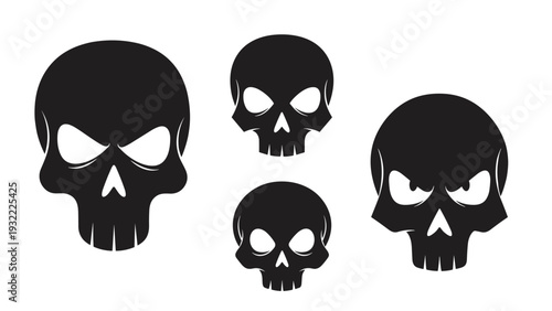 Four different aggressive-looking black skull silhouettes with sharp edges and menacing eye sockets isolated on a solid white background.