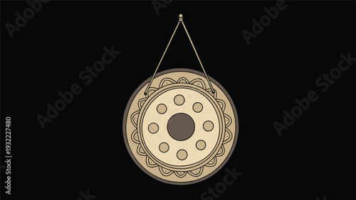 Detailed illustration of a traditional metal gong with decorative patterns hanging by a triangular cord against a solid black background.