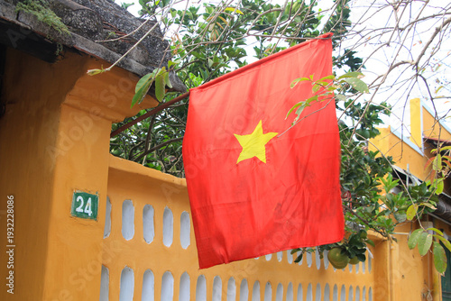 Vietnamese Flag Hanging Outside a Shop House in Hoi An, Vietnam