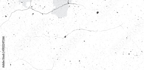 Abstract splattered paint texture with scattered dots and lines on a textured surface viewed from directly above