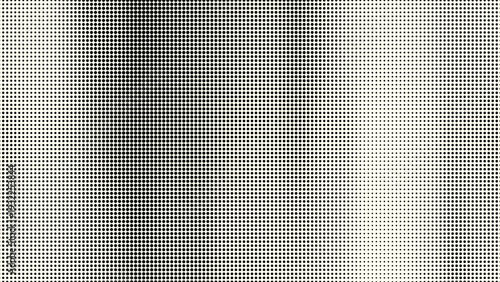 A grayscale image of a screen or mesh with a grid pattern and varying dot density