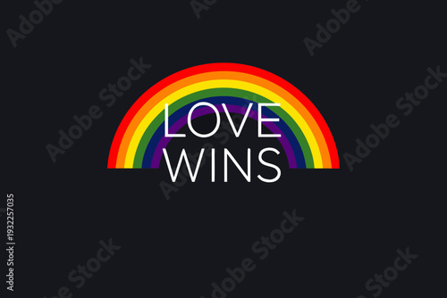 A vibrant rainbow arc with the message love wins displayed prominently