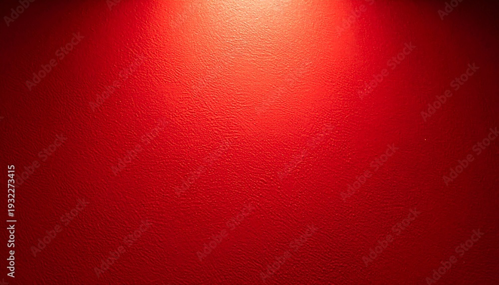 Obraz premium A red wall with a bright light shining on it