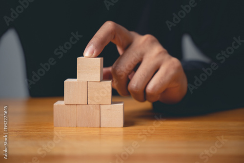 Canvastavla A powerful sign of growth, this closeup shows a man hand pose in a gesture to bu