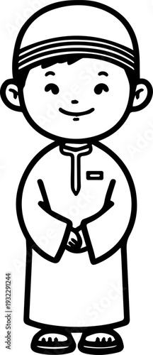 Smiling boy wearing traditional Muslim clothing and kufi cap