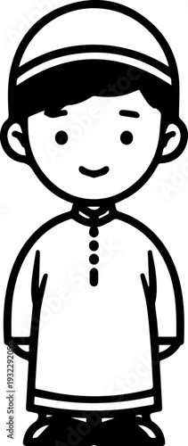 Smiling boy wearing traditional Muslim clothing and kufi cap