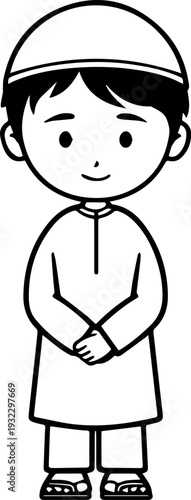 Smiling boy wearing traditional Muslim clothing and kufi cap