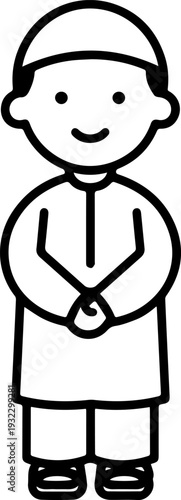 Smiling boy wearing traditional Muslim clothing and kufi cap