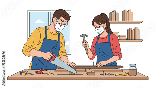Man and woman wearing face masks and aprons working in a carpentry workshop using a saw and hammer to build wooden furniture together.