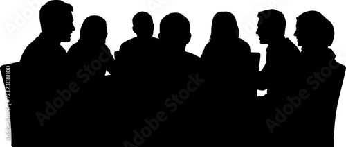 Mysterious silhouette of a group of people seated around a table engaging in a private meeting or collaborative discussion