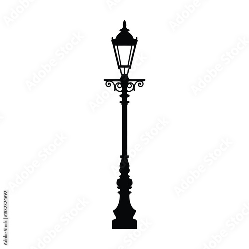 A solitary black street lamp stands prominently against a white background