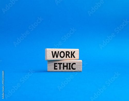 Work Ethic symbol. Concept words Work Ethic on wooden blocks. Beautiful blue background. Business and Work Ethic concept. Copy space.