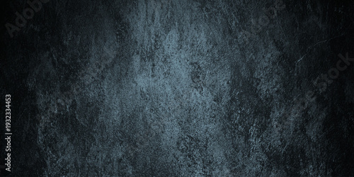 A dark wall textured background of mottled teal and gray resembling aged weathered stone or a distressed wall