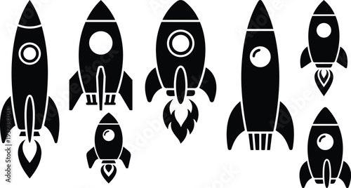 Minimalist vector rocket icon set top view and front view assorted sizes black silhouettes with launch flame details isolated on white background flat design simple modern