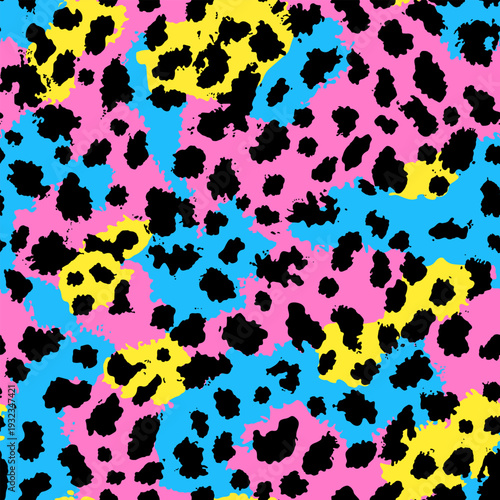 Vibrant neon leopard vector print seamless pattern with black spots over pink, blue, and yellow background, ideal for trendy fashion, textiles, and bold graphic design.