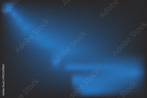 Abstract Glowing Blue Neon Light Streaks on Dark Background with Motion Blur