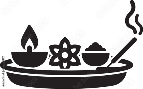 Black vector icon of puja thali with candle, flower, and incense