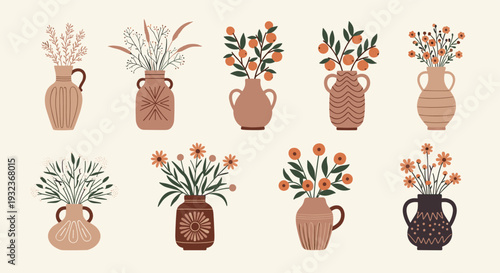 Beautiful collection of different floral arrangements, leafy branches, and berries displayed in a variety of ornate ceramic vases.