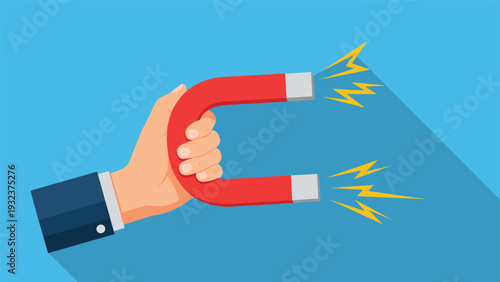 Human hand holding a large red horseshoe magnet attracting bright yellow energy sparks against a clean blue background.