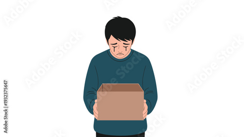 Young man in a dark shirt crying while holding a cardboard box after being fired or moving out from a home.
