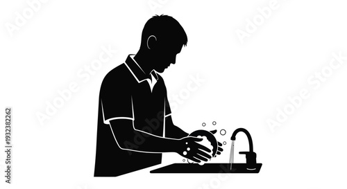 Silhouette of a man washing his hands at a sink