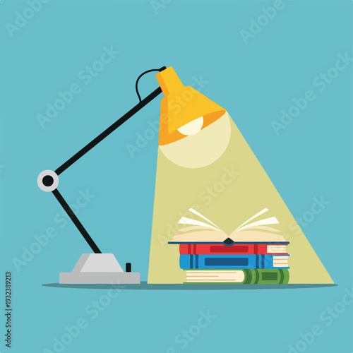 A study lamp illuminates an open book atop a stack of colorful books