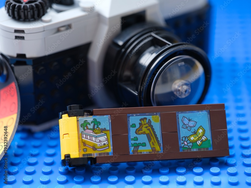 Naklejka premium Tambov, Russian Federation - February 20, 2026 Lego Creator Retro Camera with film strip accessory with colorful printed scenes