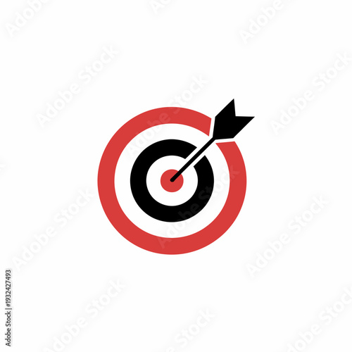 Red and black target with arrow hitting bullseye perfectly centered