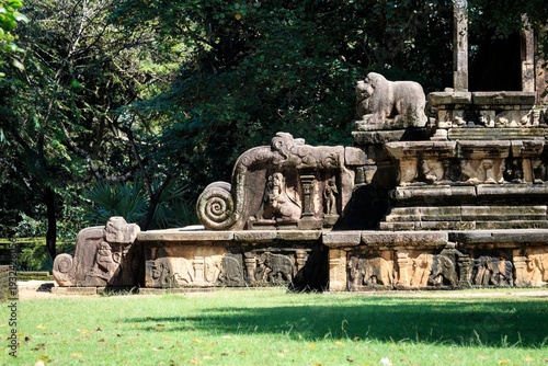Fotografie Ancient Stone Carvings of Lions and Elephants at Polonnaruwa Ruins