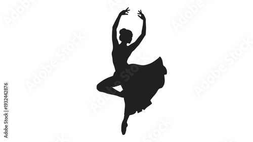 Silhouette of a ballerina in a dynamic pose arms raised and skirt flowing