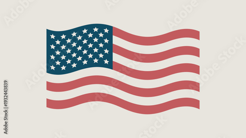 The American flag waving gently in the wind on a beige background