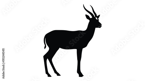 Silhouette of an african gazelle standing in profile against a white background