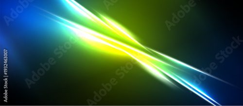 Abstract energy lines intersect. Vivid blue, green, yellow hues create dynamic visual effect. Dark background emphasizes bright streaks.